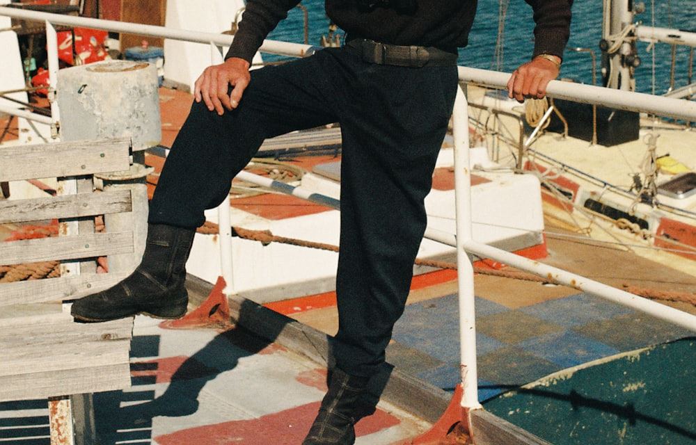 Seafarer in working uniform on a vessel deck